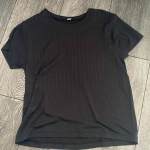 Black shirt with little holes! Great for working out!
